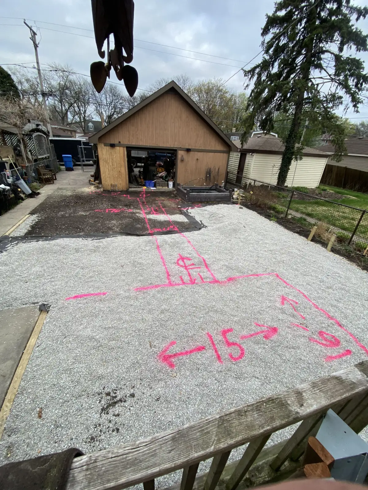 French drain installation with drainage stone in Michigan