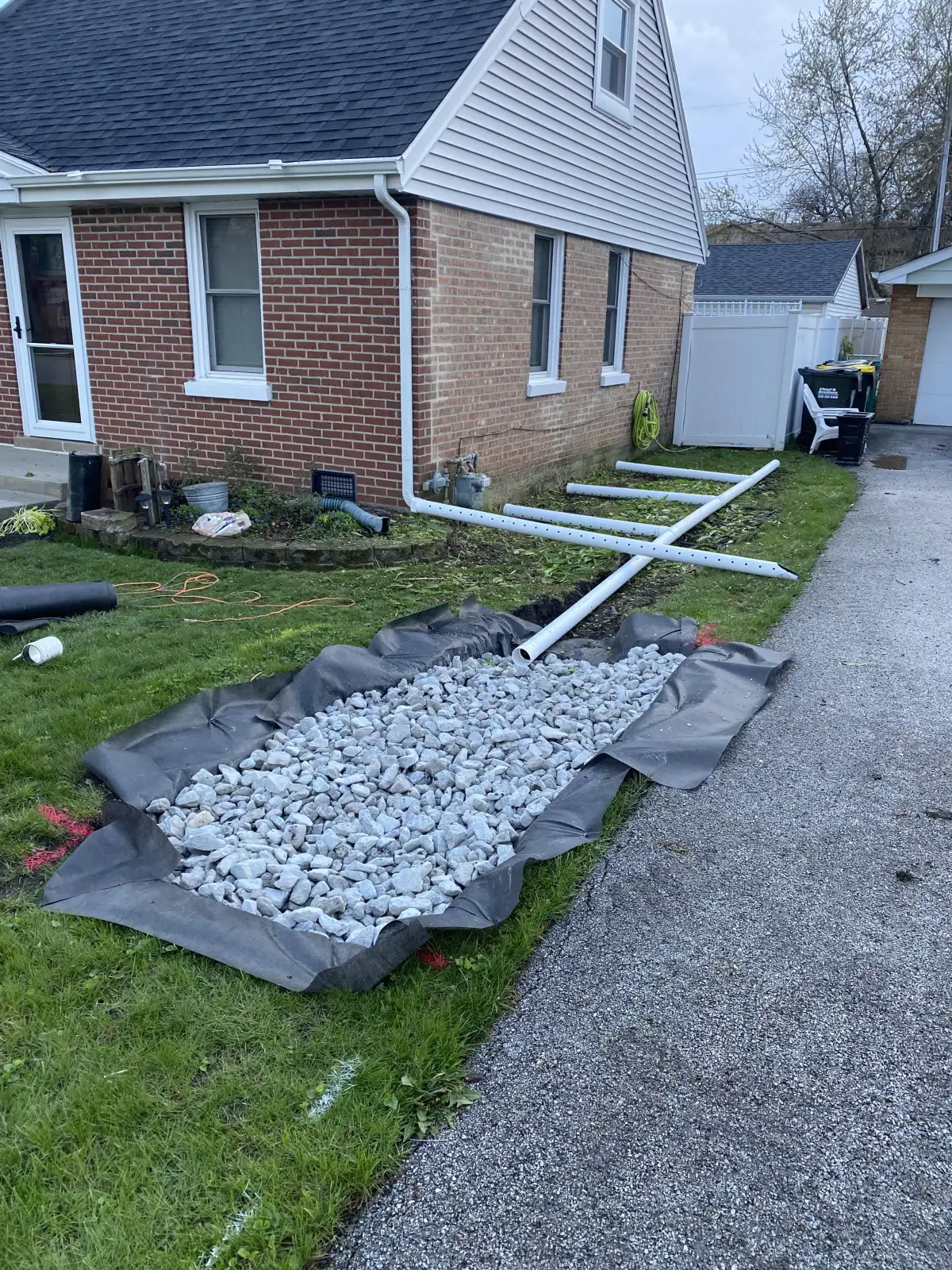 Drainage stone base installation for Michigan freeze-thaw protection