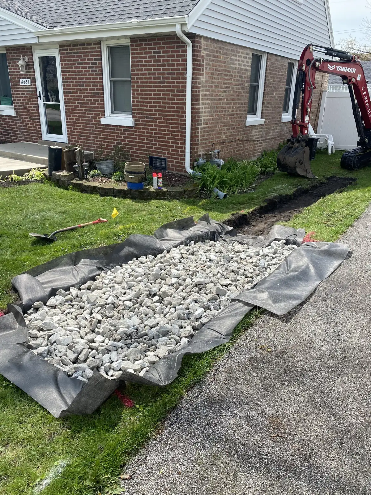 French drain installation in Michigan yard