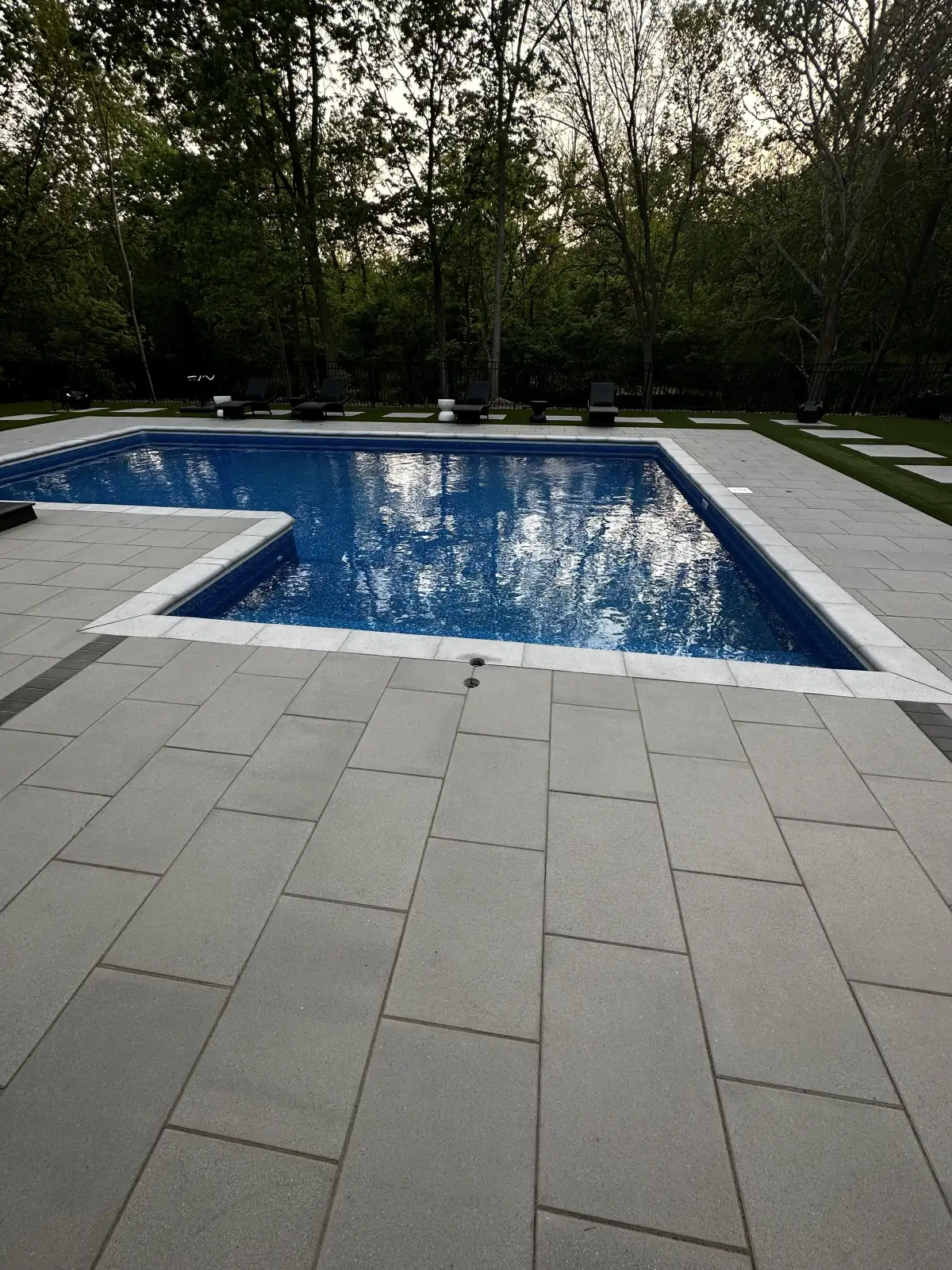 Natural stone walkway with landscape lighting