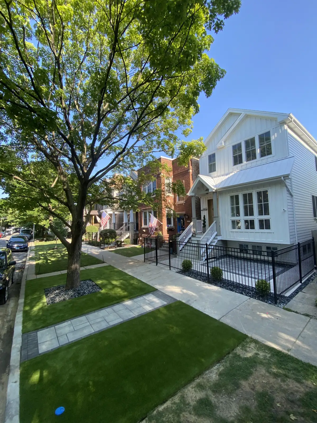 Low-voltage landscape lighting illuminating a Michigan backyard